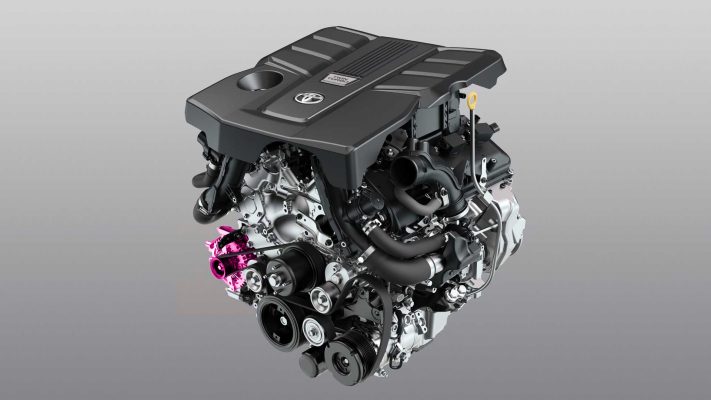 Toyota Land Cruiser 300 engine bay with alternator visible